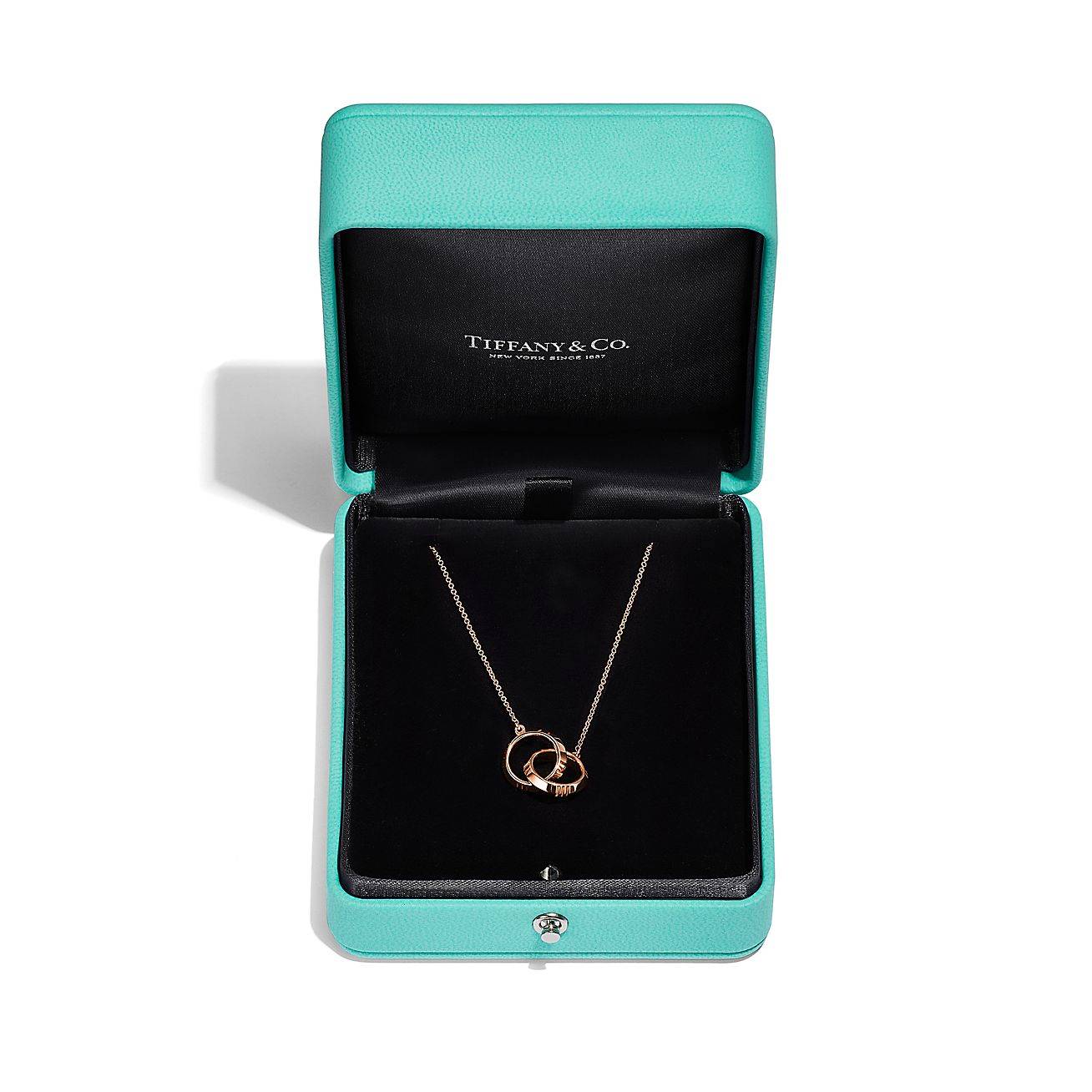 TIFFANY&CO. ATLAS® X CLOSED INTERLOCKING PENDANT IN ROSE GOLD 67789229