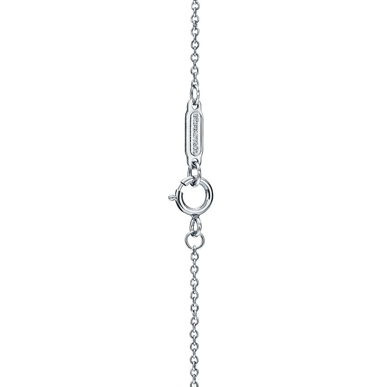 TIFFANY SOLITAIRE DIAMOND PENDANT IN PLATINUM