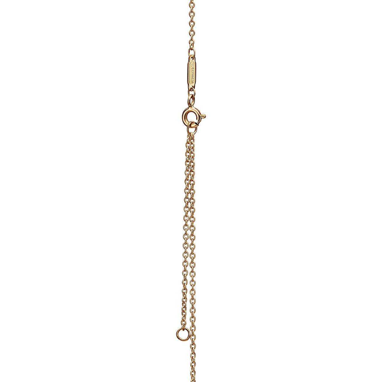 TIFFANY KNOT PENDANT IN YELLOW GOLD